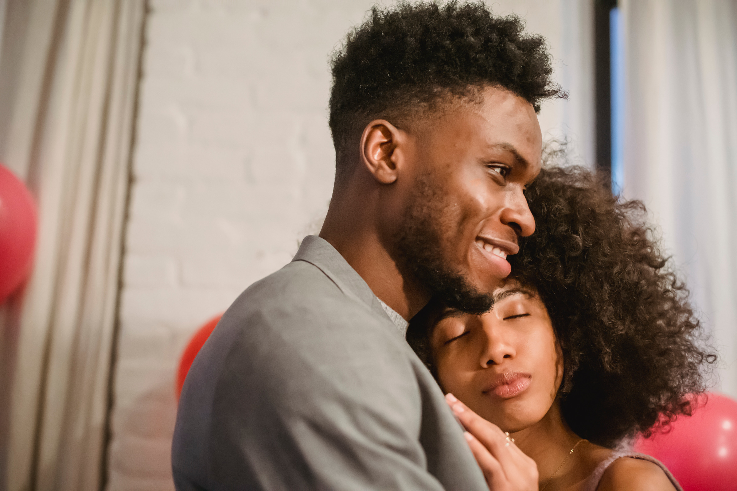Couple sharing a relaxed moment together in conversation.